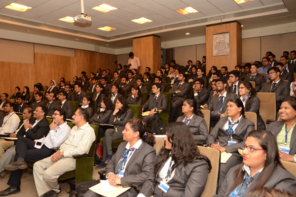 Management students learn how to manage their money and invest smartly